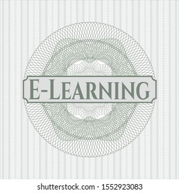 Green rosette (money style emblem) with text E-Learning inside
