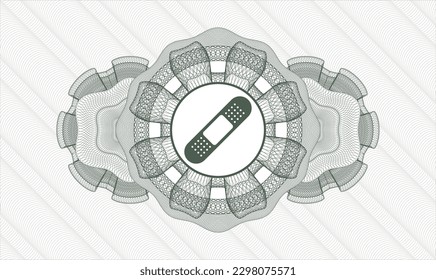 Green rosette or money style emblem. Vector Illustration. Detailed with bandage plaster icon inside