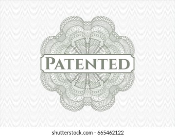 Green rosette or money style emblem with text Patented inside