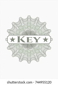 Green rosette (money style emblem) with text Key inside