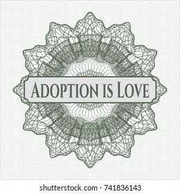 Green rosette with text Adoption is Love inside