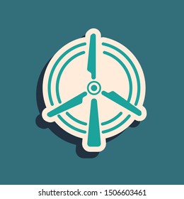 Green Rotating wind turbine icon isolated on blue background.  Vector Illustration