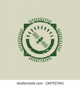 Green satelite icon inside distress rubber grunge texture seal