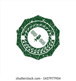 Green satelite icon inside distressed rubber grunge seal