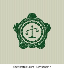 Green scale icon inside distress rubber seal with grunge texture