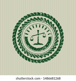 Green scale icon inside distress grunge style stamp