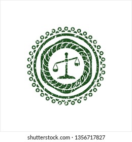 Green scale icon inside grunge stamp