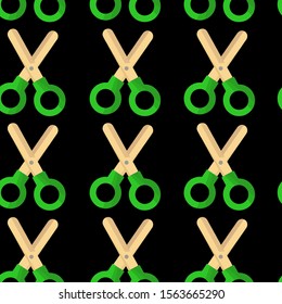 green scissors on a black background. Cute seamless background.