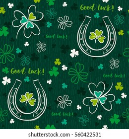 Green seamless background for Patricks day with horseshoe and shamrocks, vector illustration. Hand drawn decorative elements.