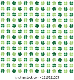 Green seamless background pattern with clovers, shamrock leaves for St. Patrick's Day. Holiday symbol