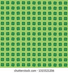 Green seamless background pattern with clovers, shamrock leaves for St. Patrick's Day. Holiday symbol