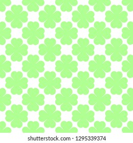 Green seamless background for your designs. Four leaf clover, a symbol of good luck.