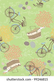 Green seamless pattern with bicycles and picnic baskets