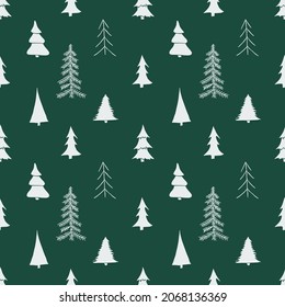 Green seamless pattern with christmas trees. New year doodle background