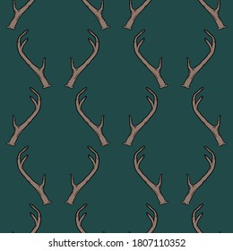 Green seamless pattern with deer antlers. Vector background illustration. Nature wildlife animal backdrop.