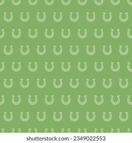Green seamless pattern with horseshoe