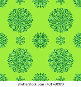 Green seamless pattern with ornamental round design elements