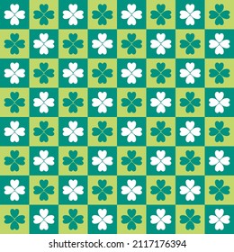 Green seamless pattern st Patric day background with shades of green and white clover lucky leaf in checked pattern vector