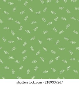 Green seamless pattern with white flower leaves.