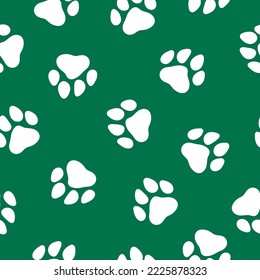 Green seamless pattern with white paws