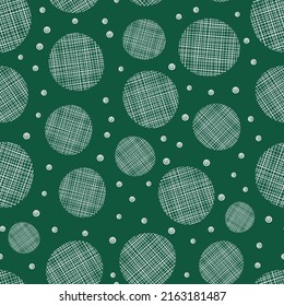 Patrón transparente verde con círculos textiles blancos.