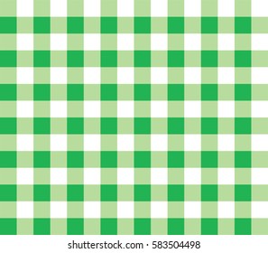 Green seamless table cloth with plaid gingham picnic pattern. 