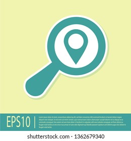 Green Search location icon isolated on yellow background. Magnifying glass with pointer sign. Vector Illustration