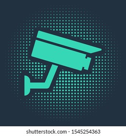 Green Security camera icon isolated on blue background. Abstract circle random dots. Vector Illustration