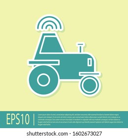 Green Self driving wireless tractor on a smart farm icon isolated on yellow background. Smart agriculture implement element.  Vector Illustration