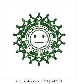Green serious face icon inside distress rubber texture