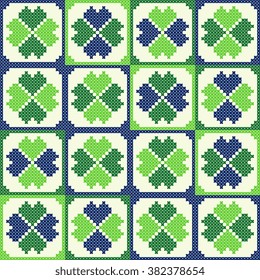 Green serviette in spring color for St. Patricks day. Cross-stitch stylization.
