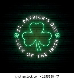Green shamrock neon sign. Vector design for web banner, logo, emblem and label. Bright neon signboard with text Luck of the Irish and clover leaf. Happy St. Patrick’s day. 