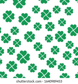Green shamrock seamless pattern. Background of fourleaf clovers. Simple flat vector illustration.