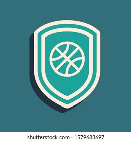 Green Shield in the basketball ball inside icon isolated on blue background. Long shadow style. Vector Illustration