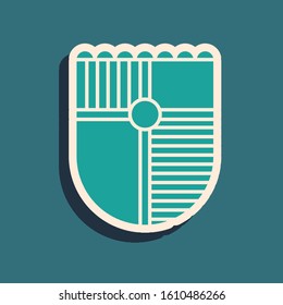 Green Shield for game icon isolated on blue background. Long shadow style. Vector Illustration
