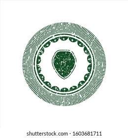 Green shield icon inside distress rubber texture