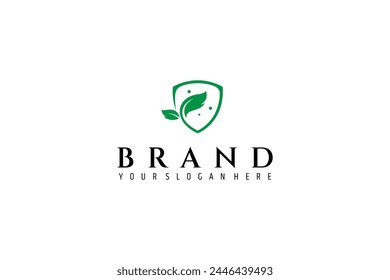 Green shield logo with leaf shape