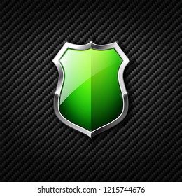 Green shield on carbon background. Vector illustration