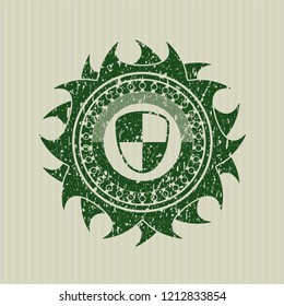 Green shield, safety icon inside distressed grunge stamp