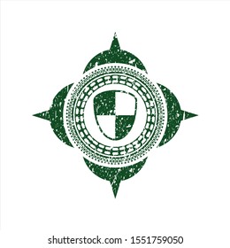 Green shield, safety icon inside rubber stamp