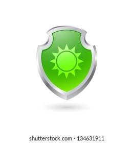 Green shield with the sun. EPS10 vector.
