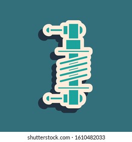 Green Shock absorber icon isolated on blue background. Long shadow style. Vector Illustration