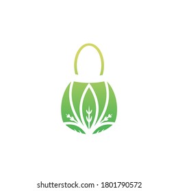 Green shopping bag in floral style made of leaves and twigs. Reuse or recycle eco package. Natural healthy farm products or organic food. Vector illustration. No plastic Go green rustic concept