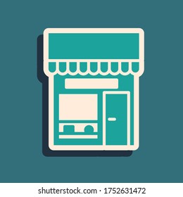 Green Shopping building or market store icon isolated on green background. Shop construction. Long shadow style. Vector Illustration