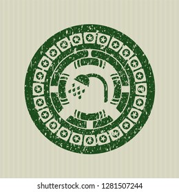 Green shower icon inside rubber grunge texture seal
