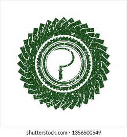 Green sickle icon inside rubber grunge texture seal