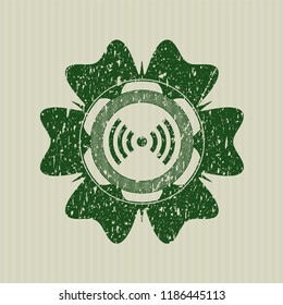 Green signal icon inside distressed with rubber seal texture
