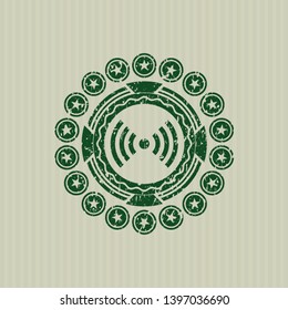 Green signal icon inside distressed rubber texture