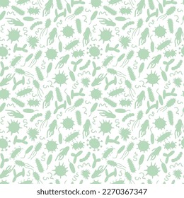 Green silhouette of microorganisms seamless pattern. Hand drawn, doodle style, on white background.