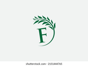 Green and single laurel wreath logo vector with the letter and alphabets